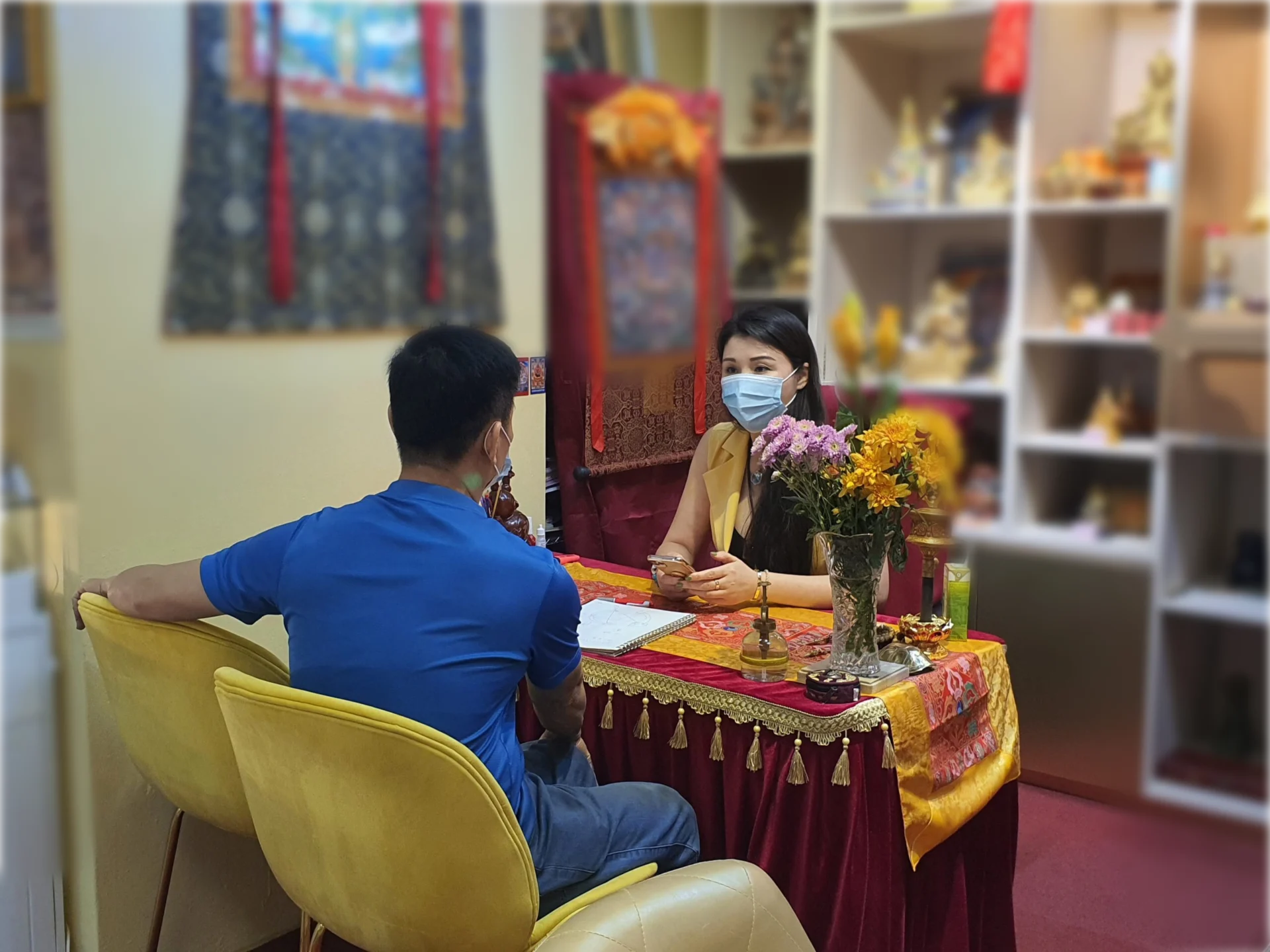 Asian Man And Woman In A Consultation